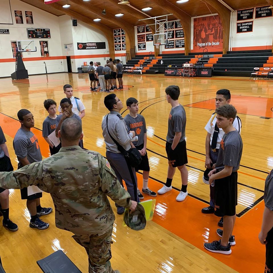 Cadets meeting on the basketball court
